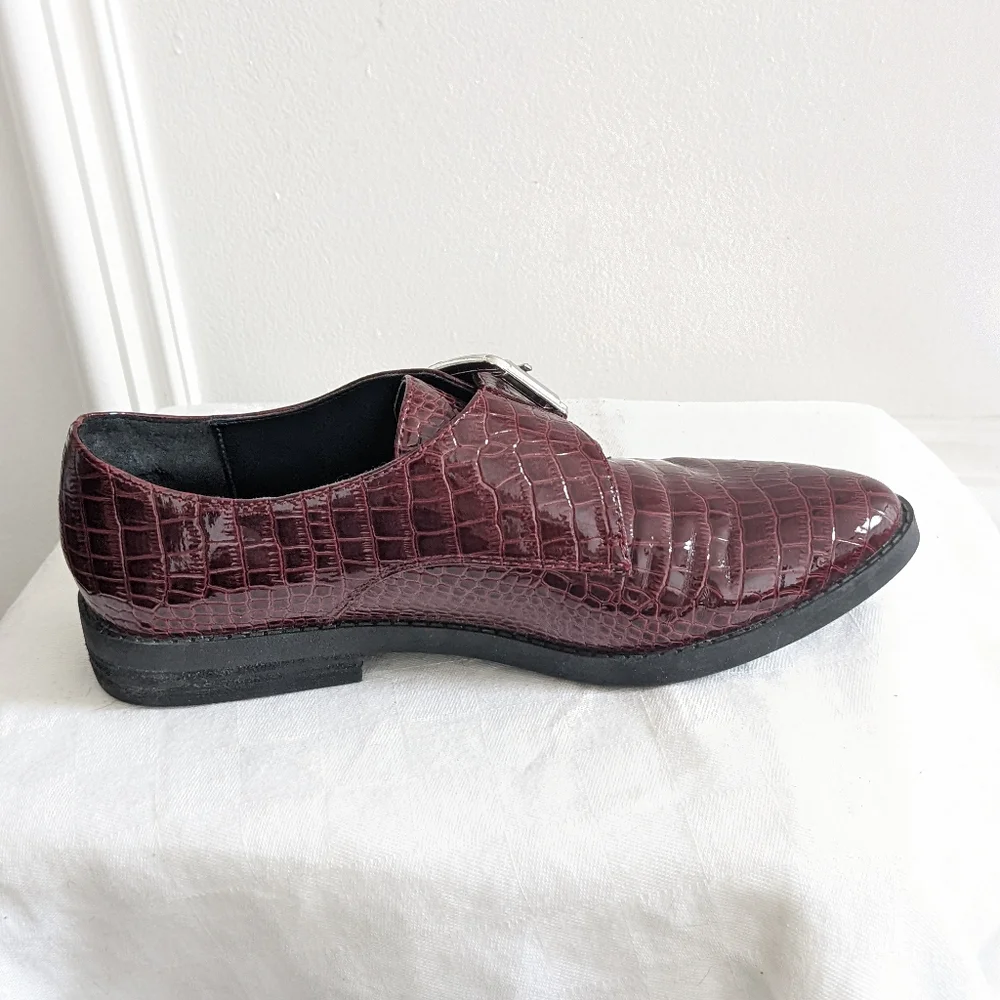 Patent leather loafers by Aldo